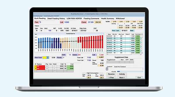 laptop screen displaying software for cattle producers